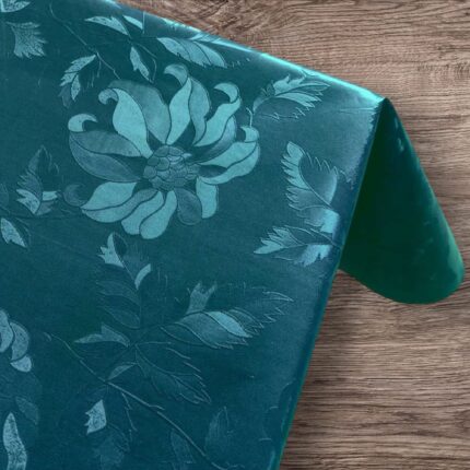 Blå voksdug med blomster i damask. Praksiske ensfarvede duge af PVC. Certificeret SGS og godkendt. Nem at tørre af med en fugtig klud. Køb i metermål.